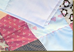 The Brown & Pink Penguins Baby Quilt